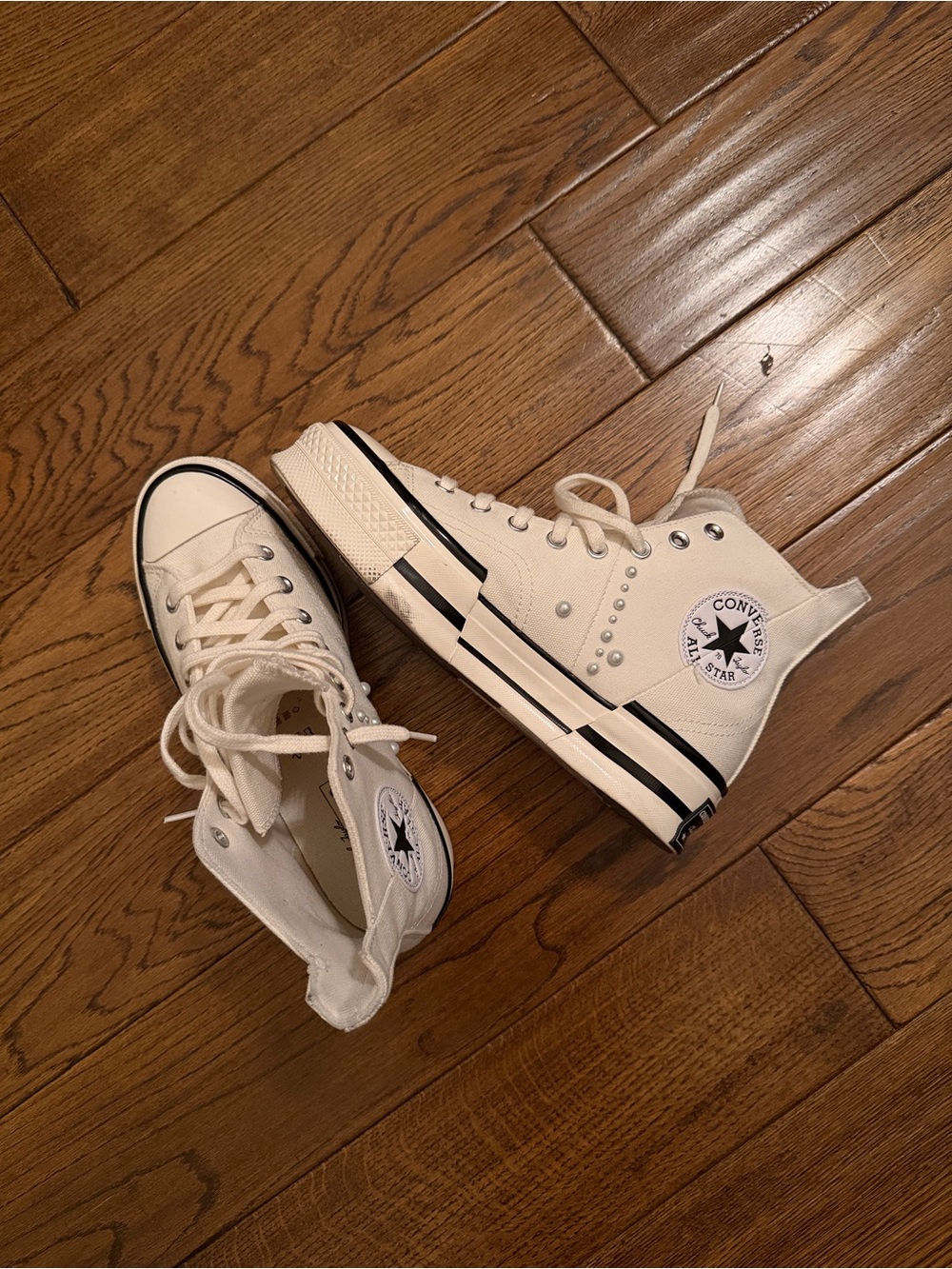 Almost new Converse High Top Sneakers in Off-White/Cream with Black Trim